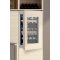Multi-purpose built in wine cabinet for the storage and service of wine
