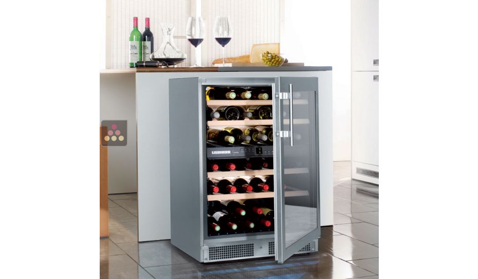 Dual temperature wine cabinet for storage and/or service
