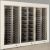 Built-in modular combination of 3 professional multi-temperature wine display cabinets - Horizontal/inclined bottles - Flat frame