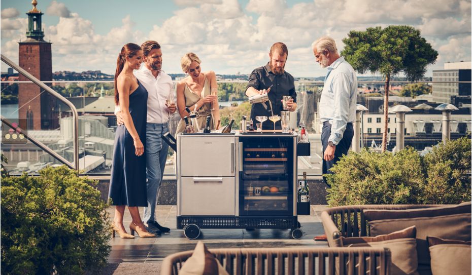 Outdoor mobile bar with dual temperature refrigerated cabinet and insulated presentation bin