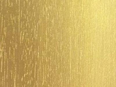 Wooden cladding painted in Gold colour with a paint containing metal particles