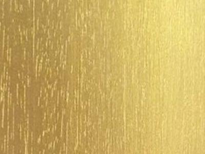 Wooden cladding painted in Gold colour with a paint containing metal particles